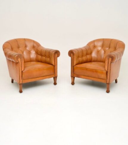 antique-swedish-leather-club-armchairs-1910-set-of-2-1.jpg